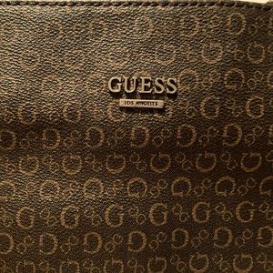 GUESS leather handbag, Brown, medium size, silver chain and leather strap.